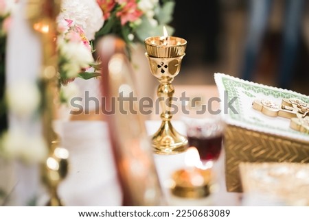 Golden crowns lying on the table in church