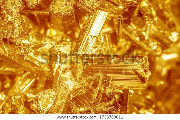 Golden crystal mineral stone.\
Gems. Mineral crystals in the natural environment. Texture of\
precious and semiprecious stones. Seamless background with copy\
space.