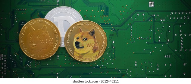 Golden dogecoin coins. Cryptocurrency dogecoin. Doge cryptocurrency. - Shutterstock ID 2012443211