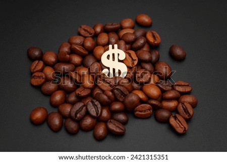 Golden dollar sign nestled within a pile of roasted coffee beans against a sleek black backdrop. Coffee price to taste ratio concept.