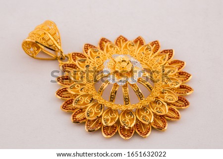 Golden Double layer Flower pendent isolated in white background