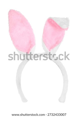 Golden Easter egg with bunny ears headband isolated on white