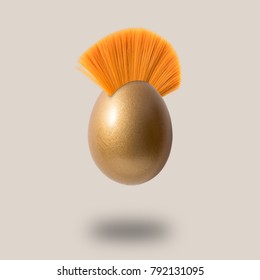 Golden Easter Egg With Mohawk Hair. Minimal Concept.