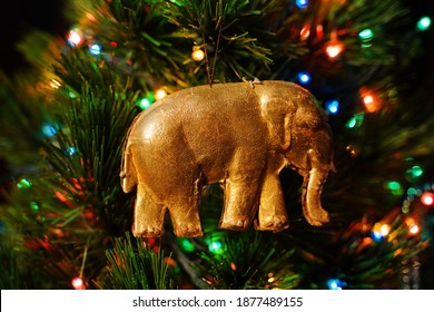 The golden elephant. Vintage Christmas ornament. Antiques DRESDEN Cardboard.