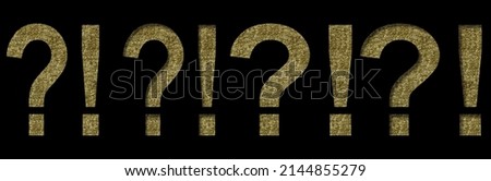 Golden exclamation and question marks cut out of black paper on the backdrop of a pattern of gold threads, decorative font.