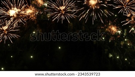 Golden Firework celebrate anniversary happy new year 2024, 4th of july holiday festival. Gold firework in the night time celebrate national holiday. Countdown to new year 2023 gold party time event