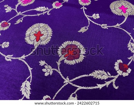 Golden floral jaal woven with hint of red on Blue silk brocade fabric