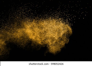 Golden Flour  Powder Dust Explosion On Black Background