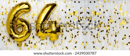 Golden foil balloon number, figure sixty-four on white with confetti background. 64th birthday card. Anniversary concept. birthday, new year celebration. banner, copy space.