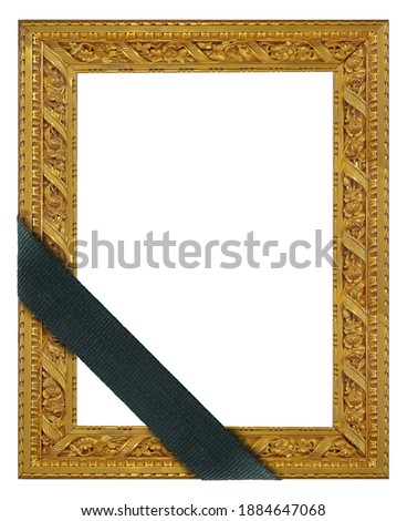 Golden frame with black mourning ribbon for paintings, mirrors or photo isolated on white background