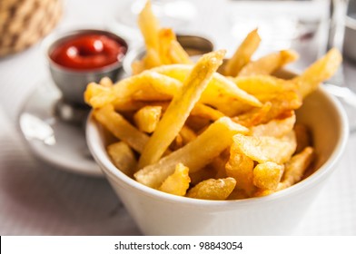 Golden French fries potatoes ready to be eaten