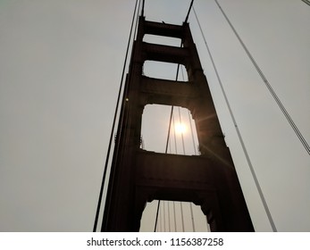 Golden Gate Bridge Looking Up At The Sun 