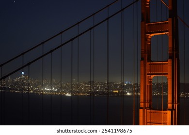 Golden Gate Bridge nighttime glowing San Francisco skyline Bridge - Powered by Shutterstock