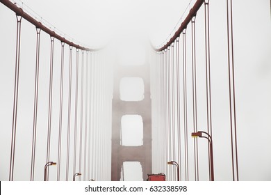 Golden Gate Bridge On Foggy Day In San Francisco White Cloudy Sky