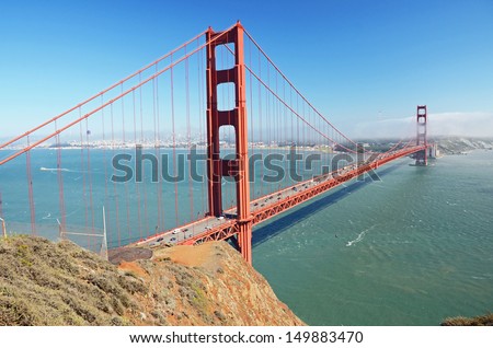 Golden Gate Bridge - a suspension bridge spanning the Golden Gate, the opening of the San Francisco Bay into the Pacific Ocean