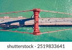 Golden Gate Bridge Top Down Aerial Drone View of cables with cars