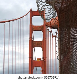 golden gate bridge tower with barbed wire in san francisco - Powered by Shutterstock