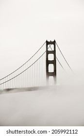 Golden Gate Bridge Tower In Fog Closeup In San Francisco