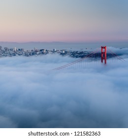 Golden Gate At Dawn Surrounded By Fog