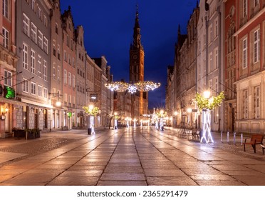 Golden gate of Long market decorated with Christmas illuminations at night, Gdansk, Poland. - Powered by Shutterstock