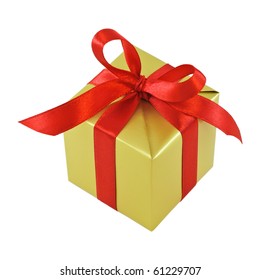 Golden Gift Wrapped Present With Red Satin Ribbon Bow Isolated On White