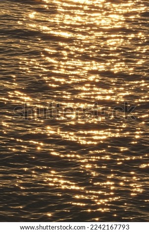 golden glistening ripples at twilight