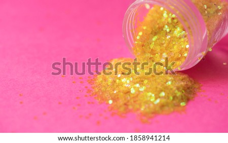 Golden glitter spillage textured background abstract