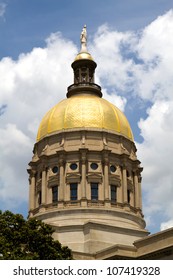 Golden Globe Of Georgia Capitol Dome In Atlanta, Georgia, USA Against A Cloudy Blue Sky.