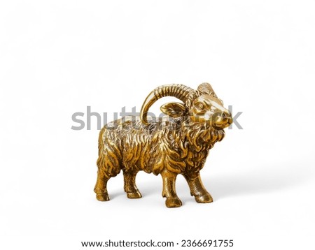 Golden goat miniature animal on white background