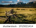 Golden Grass and Wooden Fence leading up to Mount Heyburn in the Sawtooth National Forest of Idaho