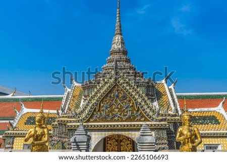 Golden Guardians Statues Hor Phra Naga Tomb Grand Palace Bangkok Thailand  Palace was home of KIng of Thailand from1782 to 1925