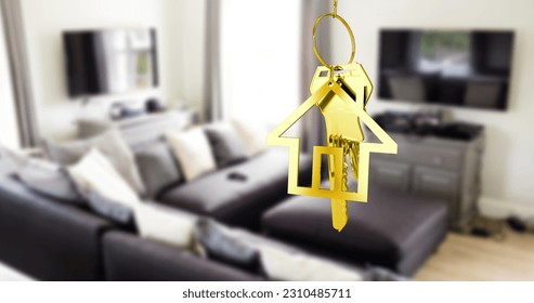 Golden hanging house key against interior of a modern living room. real estate and house ownership concept - Powered by Shutterstock