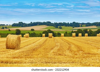 Golden Hay Bales In French Countryside