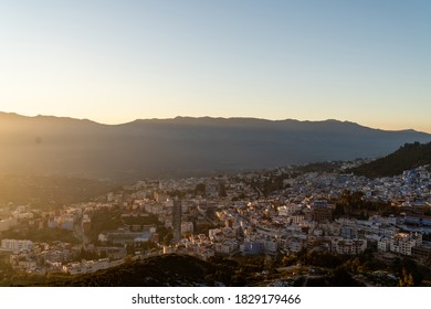 Golden Haze Over The City Of Chefchaouen, Morocco