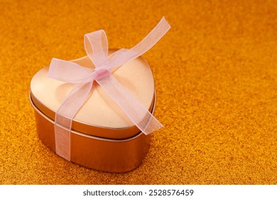 Golden heart shaped gift box - Powered by Shutterstock