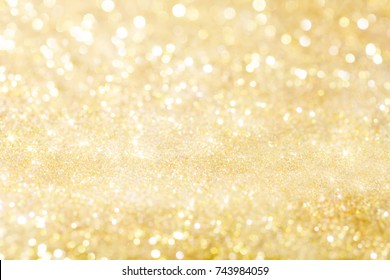 Golden Holiday Background Bokeh. Abstract Background.