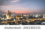 Golden hour sky with city rooftop view blur background with cityscape business corporate office building landscape blurry twilight night lights skyline nightlife bokeh for evening party 