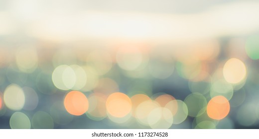 Golden Hour Sky With City Rooftop View Blur Background With Cityscape Business Corporate Office Building Landscape Blurry Twilight Night Lights Skyline Nightlife Bokeh For Evening Party 