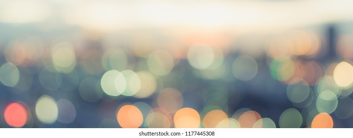 Golden Hour Sky With City Rooftop View Blur Background With Cityscape Business Corporate Office Building Landscape Blurry Twilight Night Lights Skyline Nightlife Bokeh For Evening Party 