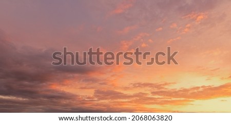 Golden hour sky with clouds. Ideal for sky replacement in modern photo editing software tools.
