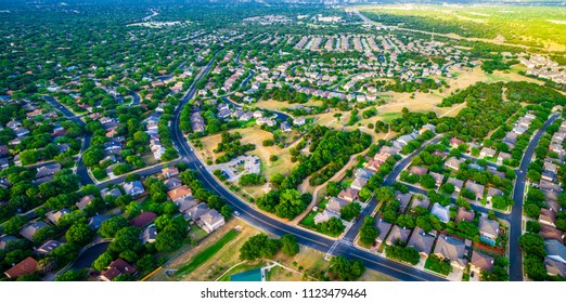 Golden Hour Sunset Colors Real Estate Development Suburb Neighborhood Outside Of Austin In Round Rock , Texas Amazing Landscape Above Houses And Homes