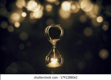 Golden Hourglass with bokeh light, abstract meaning of best time of business, celebration time - Shutterstock ID 1791288062