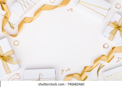 Golden Jewelry And Gift Boxes On White Background With Copy Space For Text. Fashion And Shopping Concept. Wedding, Marriage Or Birthday Composition. Flat Lay, Top View