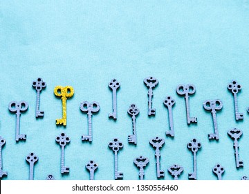 golden key among grey on blue background. right decision insight and fresh idea comcept