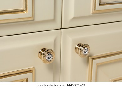 Golden Knob Of A Kitchen Door