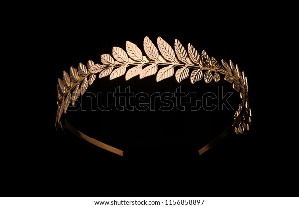 golden laurel\
wreath headband isolated on\
black