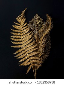 Golden leaf. Golden leaves on black background               - Shutterstock ID 1852358938