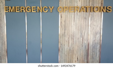 Golden Letters On The Emergency Operations Center Or EOC Room Sign