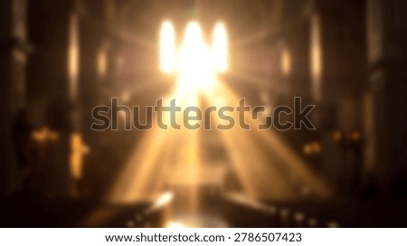 Golden light rays stream through three arched windows, illuminating a dark and blurred church interior with visible pews, creating a serene and spiritual atmosphere.