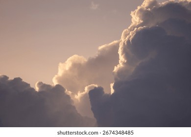 Golden light transforms a dramatic sky full of beautiful, fluffy clouds.